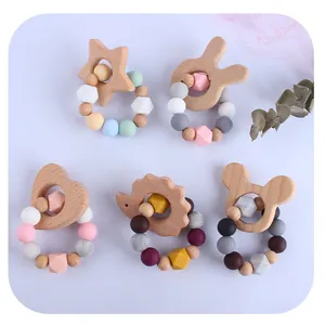 5-piece beech wood and silicone baby teething toy set with animal shapes and rattles