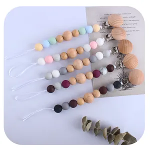 Beech wood and silicone bead pacifier clips set with natural animal themed aesthetics