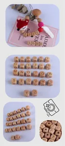 Detail of wooden alphabet beads A-Z for DIY baby pacifier clips and teething jewelry