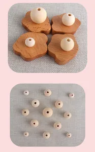 Detailed macro view of various sizes of natural wooden beads with organic grain and texture