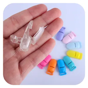 Colorful plastic pacifier clips for baby DIY crafts shown in various candy colors