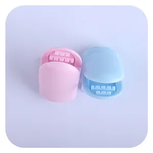 Baby pacifier clip set in pink and light blue plastic with anti-slip sawtooth design