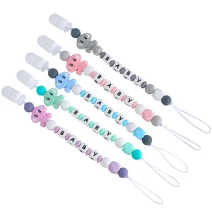 Cinque catenelle portaciuccio in silicone con elefante, perline colorate e lettere BABY