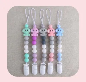 Set of five colorful silicone baby pacifier clips with cute elephant charms and beads