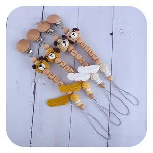 Handmade beechwood pacifier clip set with crochet bear and BABY letter beads