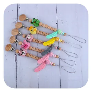 Beech wood pacifier clip set with crochet animals and silicone feather teether