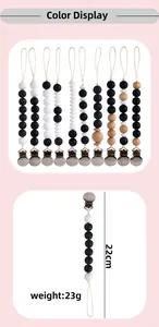 Detailed view of pacifier clip colors featuring silicone beads and beech wood accents