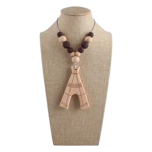 Handcrafted beech wood bird teething necklace with geometric engraved wood beads for babies