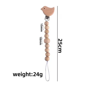 Beech wood baby pacifier clip with bird design and wooden beads chain measuring 25cm
