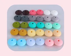 Flat lay of colorful silicone abacus beads for DIY baby pacifier clips and necklaces