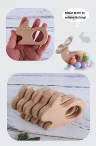 Detail of bunny beech wood teether ring with silicone beads for infant teething relief