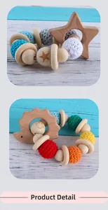 Detailed macro of beech wood baby rattle set with colorful crochet beads and charms