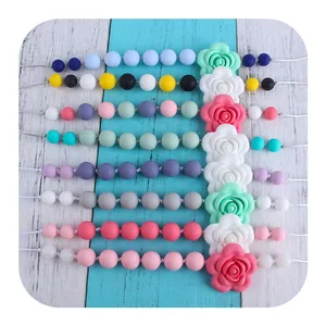 Silicone rose flower teething necklace and chewable beads for infant relief