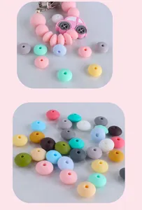 Macro detail of assorted colorful food-grade silicone abacus beads and a pink car clip