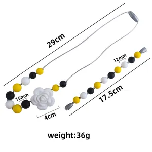Silicone baby teething set with rose pendant necklace and beaded bracelet in yellow and black