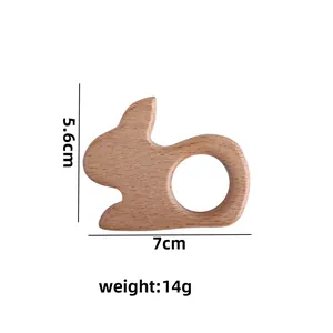 Natural beech wood rabbit teething toy for infants measuring 7cm by 5.6cm and weighing 14g