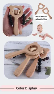 Detailed macro view of natural beech wood baby teether with bear shape and silicone beads