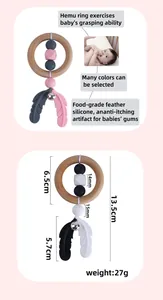 Detail view of baby teether with silicone beads, wooden ring and feather pendant dimensions