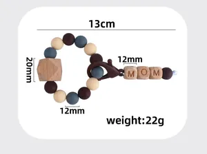 Detail of 13cm silicone and beech wood MOM keychain with lobster clasp and size labels