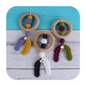 DIY baby teether rattle set with wooden rings, colorful silicone beads and feather charms