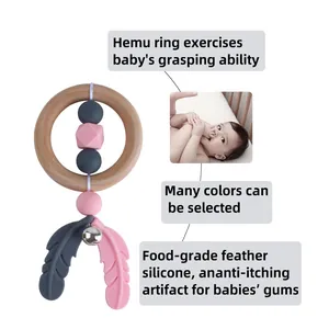 Hemu wood baby rattle with pink silicone beads and feather teether for grasping skill