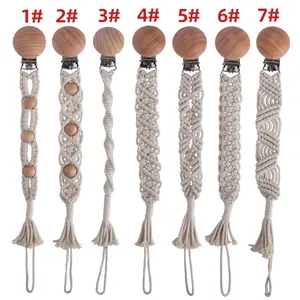 Detail of 7 styles of handmade macrame baby pacifier clips with beech wood and cotton rope
