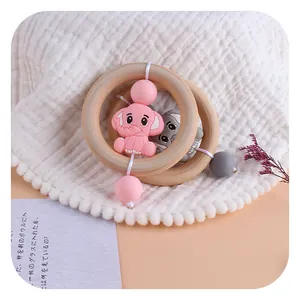 Set d'anneaux de dentition en bois pour bébé avec éléphants en silicone rose et gris