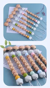 Set of 6 silicone and beech wood pacifier clips with BABY letter beads and floral decor