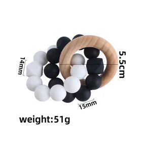 Octagonal silicone and beech wood baby teething ring with black and white beads
