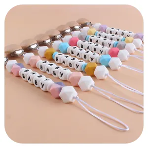 Catenella portaciuccio in legno di faggio e silicone con perline color pastello e scritta BABY