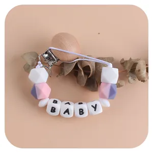 Catenella portaciuccio personalizzata in legno di faggio e silicone con perline BABY e fiori