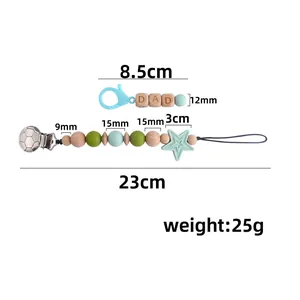 Soccer silicone pacifier clip set with wooden DAD beads and green star pendant