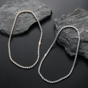Polished tennis chain necklace in gold and silver plating with round-cut cubic zirconia