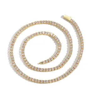 Macro shot of gold-plated tennis chain featuring sparkling round-cut cubic zirconia