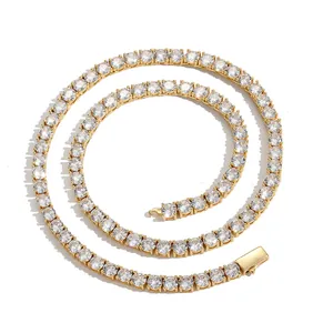 Macro shot of gold tennis chain with cubic zirconia stones in a spiral layout