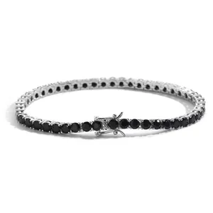 Macro view of silver tennis bracelet with black cubic zirconia and double safety latch