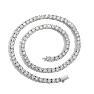 Detail of silver tennis necklace with round-cut cubic zirconia and snap clasp