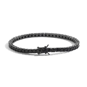 Detail of 4-prong set black zircon stones on a sleek tennis chain with security clasp