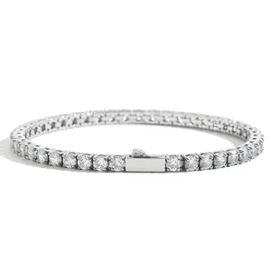 Macro detail of silver tennis chain bracelet with sparkling round-cut cubic zirconia stones