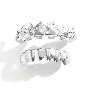 Polished silver hip hop flame grillz set for teeth featuring a bold flame design