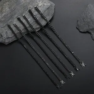 Macro detail of six black tennis bracelets with cubic zirconia and secure double clasps