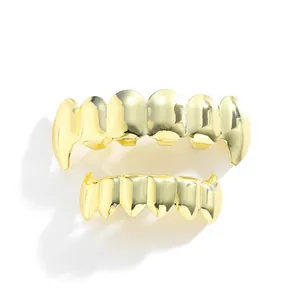 Set grillz hip hop in oro lucido per denti superiori e inferiori con design a canini