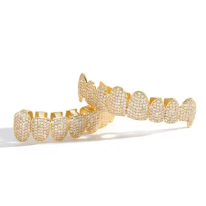 Iced out gold hip hop dental grills set with sparkling crystal stones for top and bottom teeth