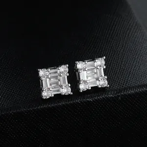 Macro shot of silver stud earrings featuring baguette-cut and round-cut cubic zirconia
