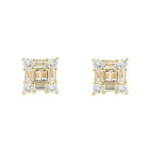 Macro detail of square gold-plated earrings with pavé set zircon stones in a geometric design