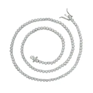 Detail of 2mm bezel-set tennis necklace featuring 925 stamp on silver metal clasp