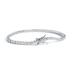Detail view of 2mm tennis bracelet with bezel-set stones and double safety clasp