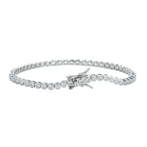 Detailed view of 2mm silver tennis bracelet with bezel-set round cubic zirconia and box clasp