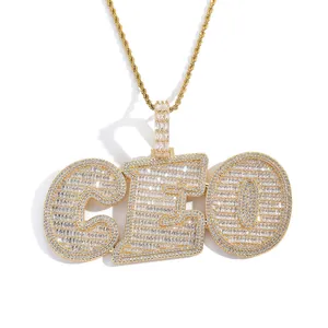 Macro shot of gold-plated CEO pendant featuring micro-paved cubic zirconia stones
