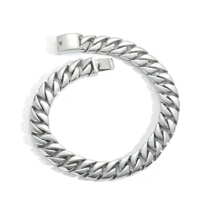 Close-up of polished silver stainless steel Cuban link chain with a secure flat clasp